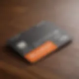 A close-up view of a Home Depot credit card on a wooden surface