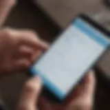 A close-up of a person checking their cell phone bill